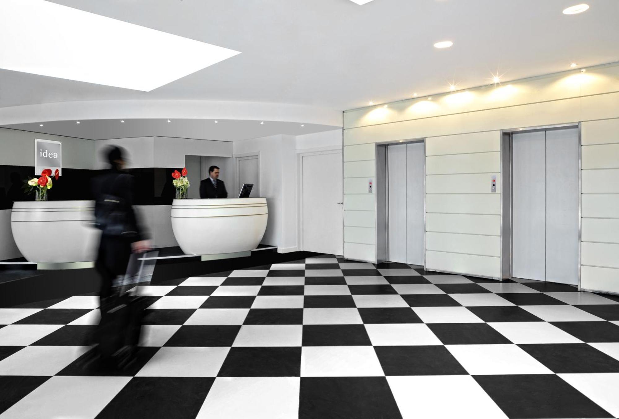 Idea Hotel Milano Malpensa Airport Case Nuove  Esterno foto Reception of a modern hotel