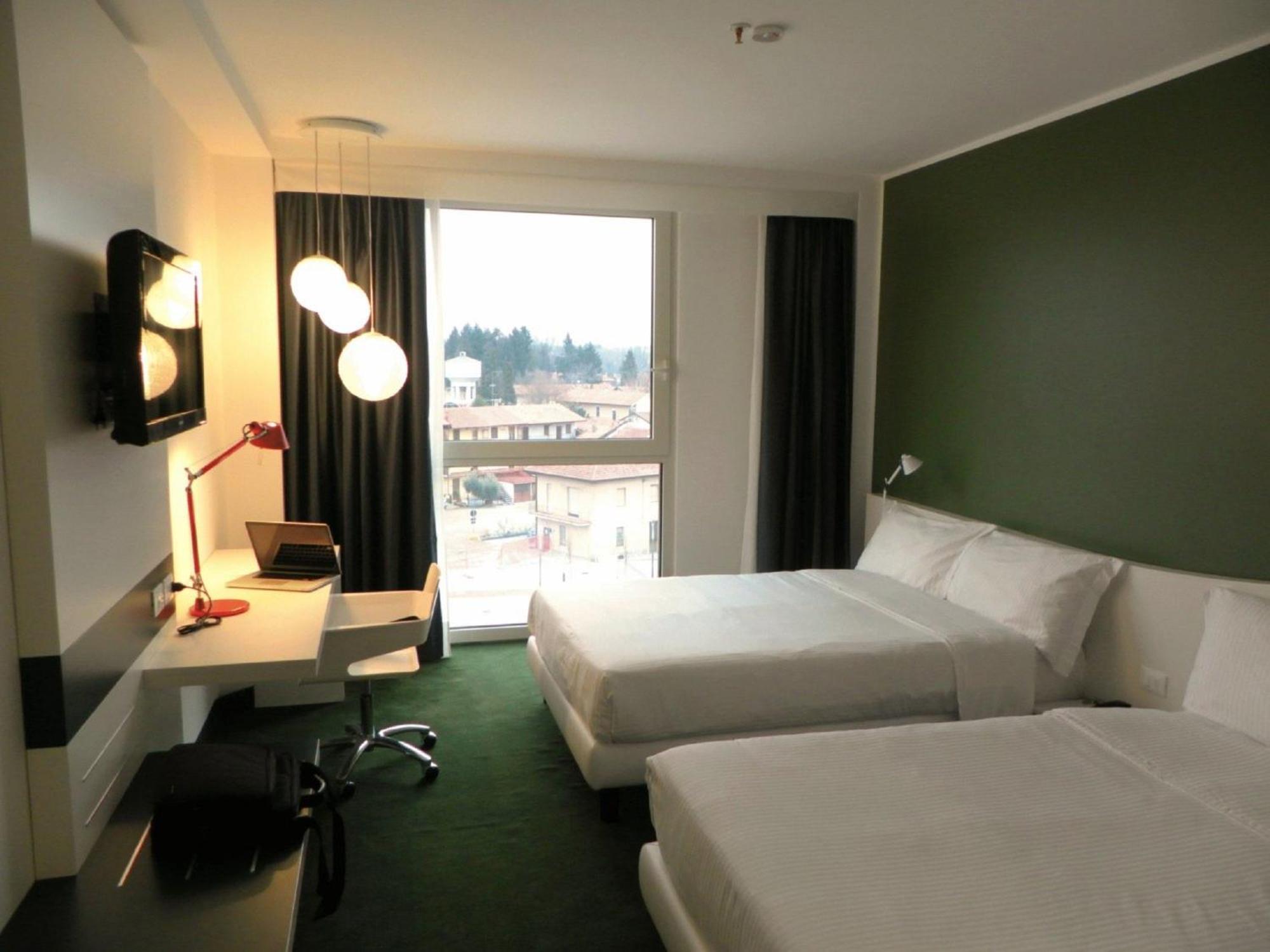 Idea Hotel Milano Malpensa Airport Case Nuove  Esterno foto Room at the hotel